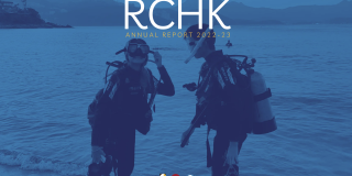 Blue filter cover with students on the beach - the cover of Annual Report 2022-23 of Renaissance College Hong Kong (RCHK)